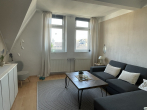 Wohnzimmer - Neues Zuhause! Charmante Maisonette-Wohnung in Haspe zu verkaufen.
